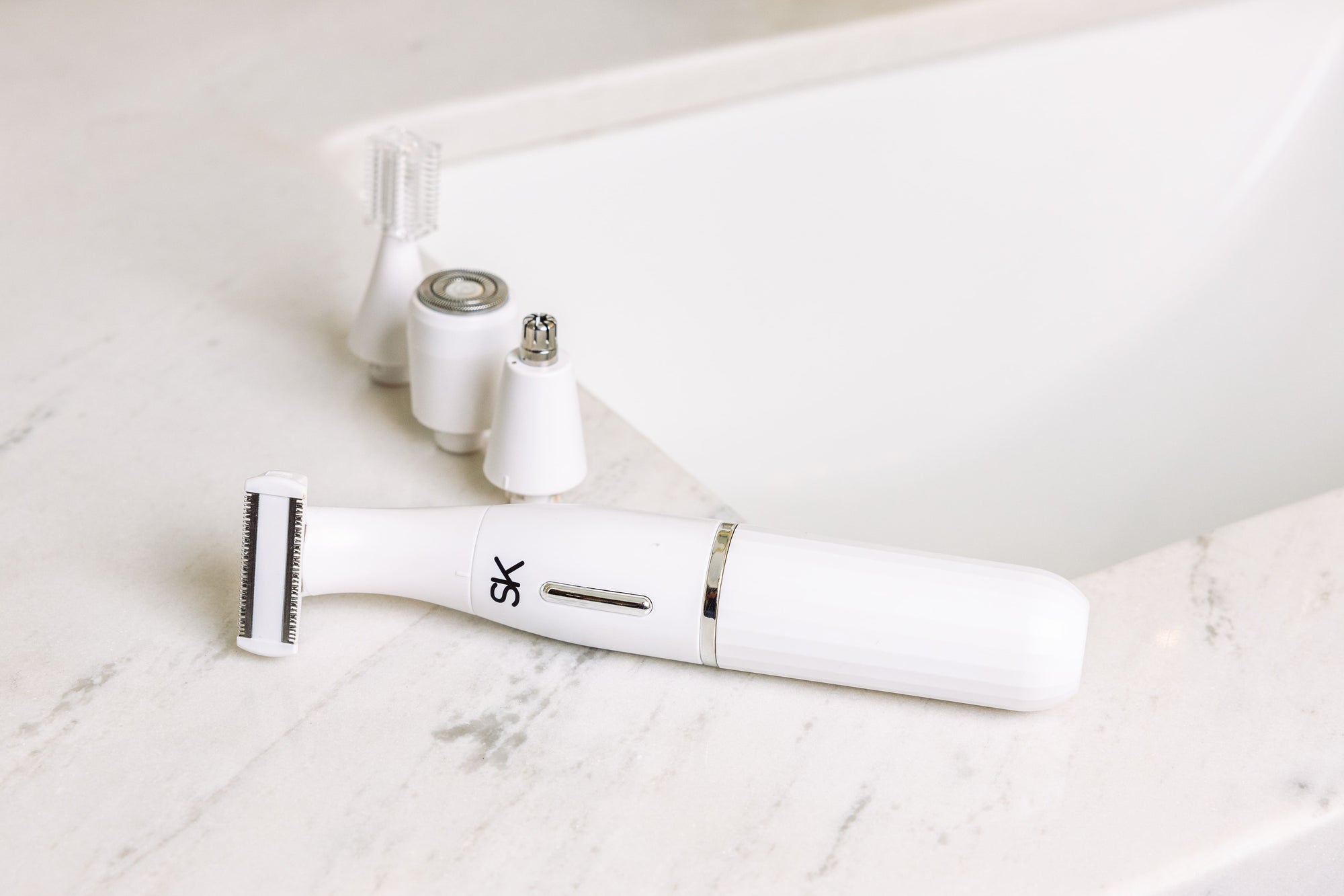 Rasuradora eléctrica multifuncional con cabezales intercambiables para depilación corporal ShinnySkin. Rasuradora electrica 4 en 1.